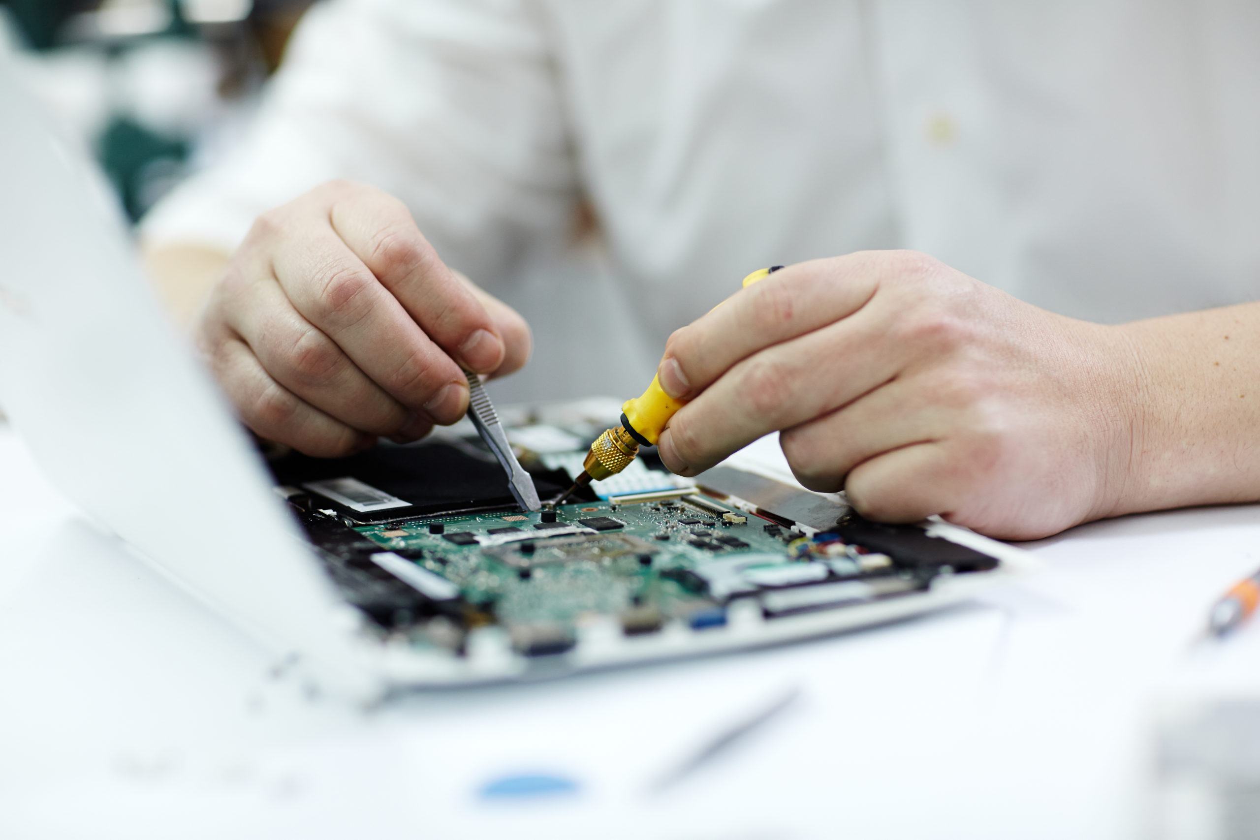 Male Hands  Repairing Laptop